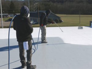 Roofers Applying Weathercoat